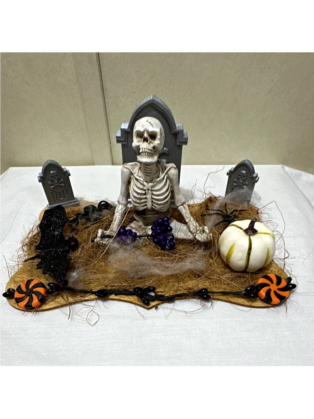 Halloween Graveyard Tabletop Scene with Skeleton and White Pumpkin